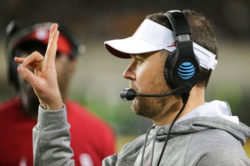 Oklahoma head coach Lincoln Riley signals in a play from the sideline during the second half of an NCAA college football game against Baylor in Waco, Texas, Saturday, Nov. 16, 2019.