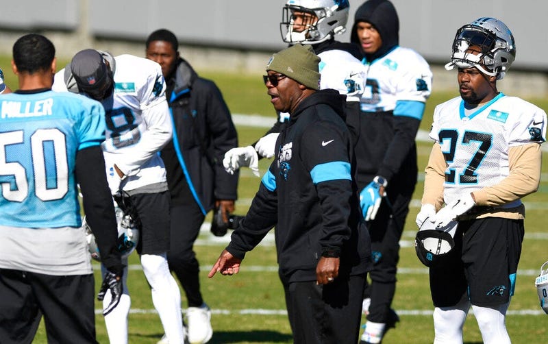 Carolina Panthers interim head coach Perry Fewell calls the team to huddle during NFL football practice at the team's training facility, Wednesday, Dec. 4, 2019, in Charlotte, N.C.