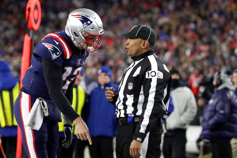 New England Patriots quarterback Tom Brady appeals to down judge Patrick Holt that wide receiver N'Keal Harry had scored a touchdown in the second half of an NFL football game against the Kansas City Chiefs, Sunday, Dec. 8, 2019, in Foxborough, Mass. Harr