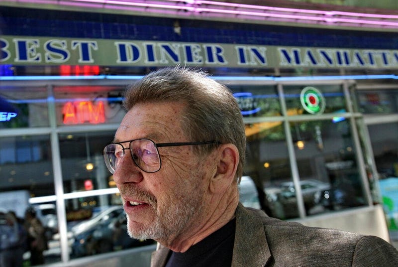 Pete Hamill responds during an interview at the Skylight Diner in New York. The longtime New York City newspaper columnist and author has died. (AP)