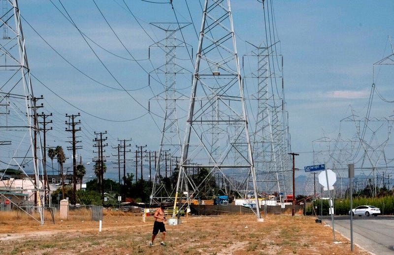 Electrical power flow and conditions are monitored at the California Independent System Operator (California ISO) grid control center in Folsom, Calif. (AP)