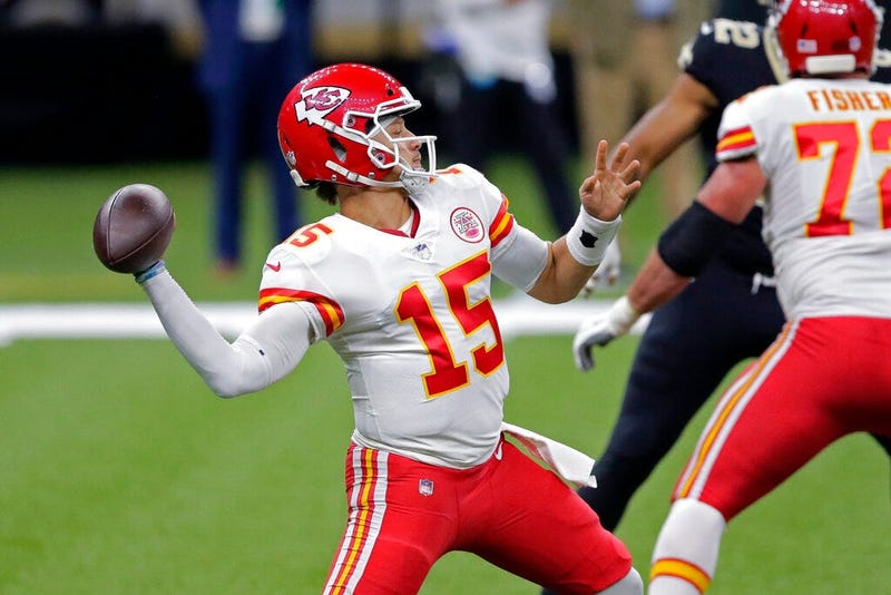 Kansas City Chiefs quarterback Patrick Mahomes (15) passes in the first half of an NFL football game against the New Orleans Saints in New Orleans, Sunday, Dec. 20, 2020.