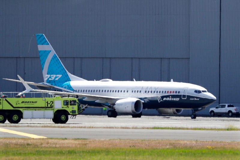 In this Monday, June 29, 2020, file photo, A Boeing 737 MAX jet taxis after landing at Boeing Field following a test flight in Seattle.