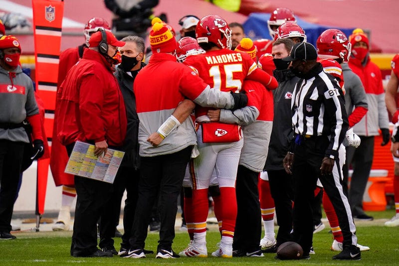 Kansas City Chiefs quarterback Patrick Mahomes (15) is helped off the field after getting injured during the second half of an NFL divisional round football game against the Cleveland Browns, Sunday, Jan. 17, 2021, in Kansas City.