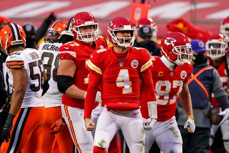 Kansas City Chiefs quarterback Chad Henne celebrates after a run during the second half of an NFL divisional round football game against the Cleveland Browns, Sunday, Jan. 17, 2021, in Kansas City.