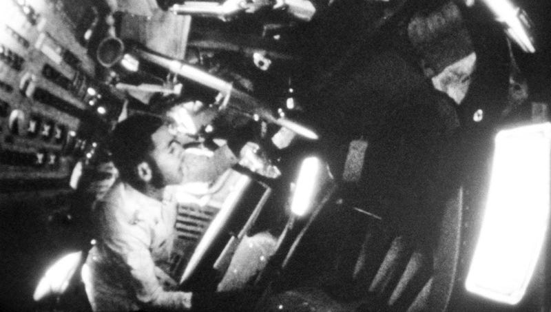 In this December 1968, file photo made available by NASA, Lt. Col. William A. Anders, Apollo 8 lunar module pilot, looks out of a window during the spaceflight.