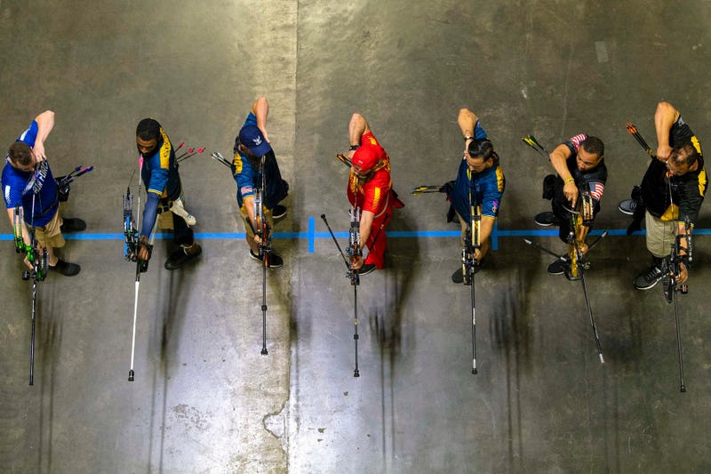 Archers draw bows during the final round of archery at the 2019 Department of Defense Warrior Games in Tampa, Fla., June 25, 2019.