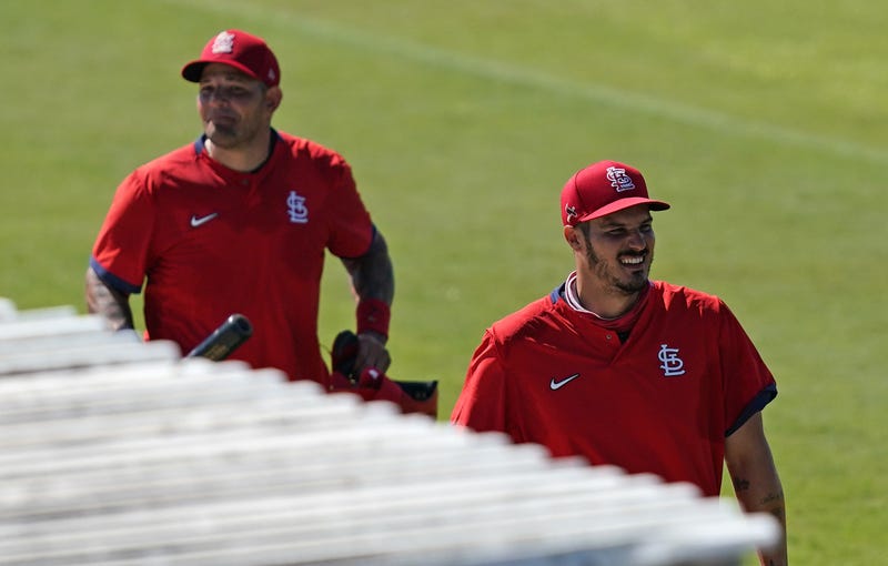 Yadier Molina and Nolan Arenado arrive at Cardinals spring training.
