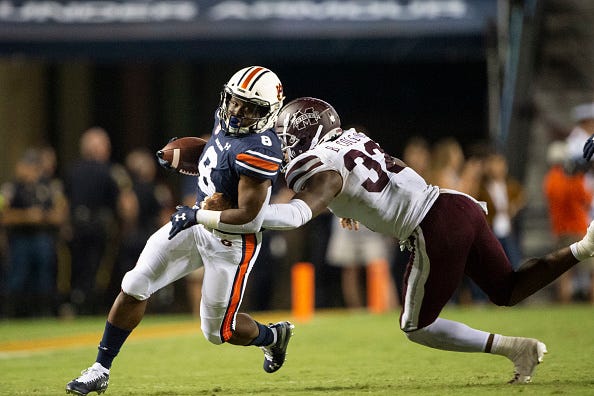 Auburn's Shaun Shivers rushes the ball against Mississippi State.