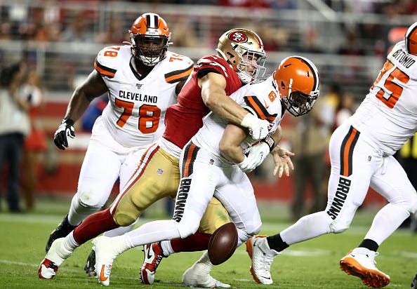 49ers DE Nick Bosa strip sacks Browns QB Baker Mayfield.