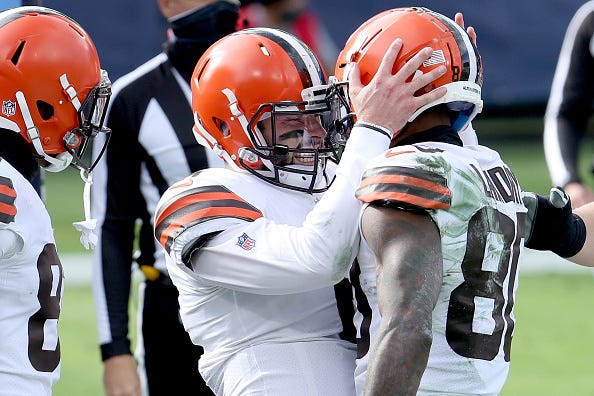 Baker Mayfield celebrates with Jarvis Landry.