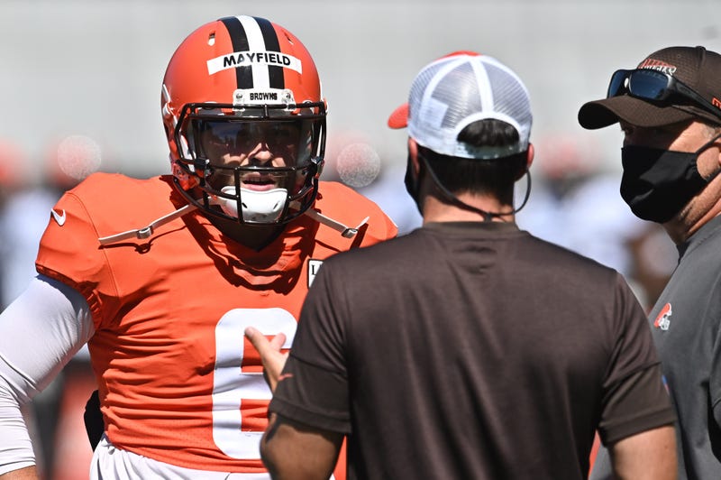 Cleveland Browns quarterback Baker Mayfield talks with head coach Kevin Stefanski during training camp at the Cleveland Browns training facility