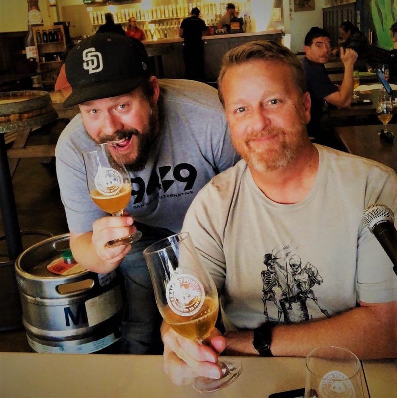 DJ Jeremy and Colby Chandler at Ballast Point with a keg of Grinner IPA