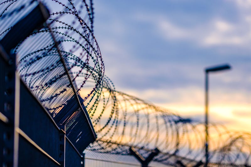 barbed wire along a prison