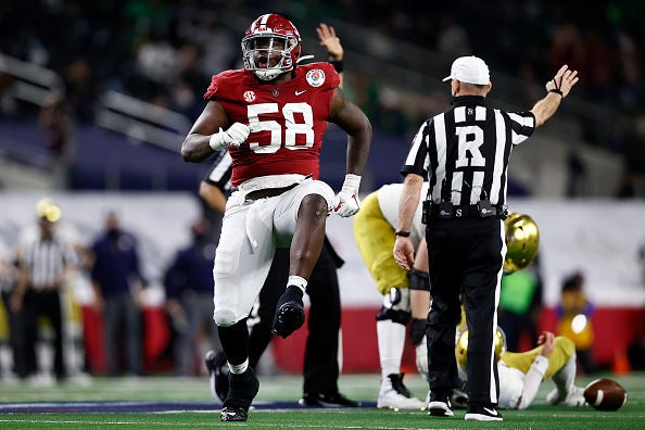Christian Barmore celebrates a sack against Notre Dame.
