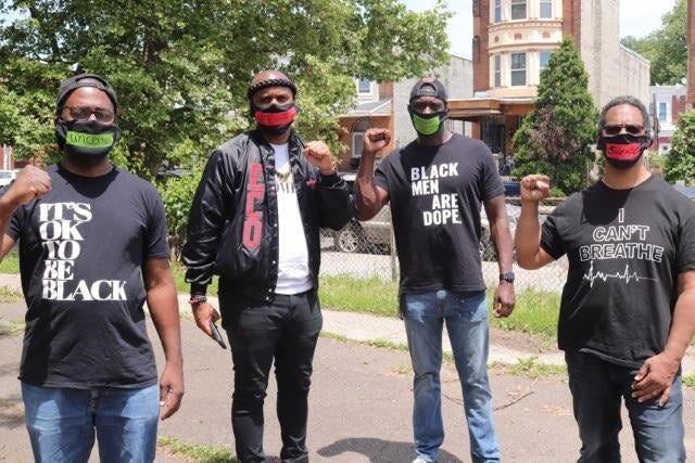 Organizers of the Juneteenth Brotherly Love Silent Men’s March, from left: Richard Washington, Kyle the Conductor, Taj Murdock, Eric Marsh.