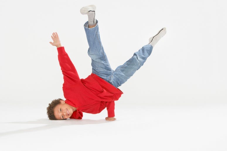 Young boy break dancing