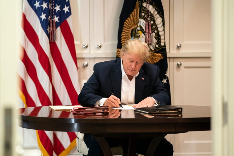 President Donald J. Trump works in the Presidential Suite at Walter Reed National Military Medical Center in Bethesda, Md. Saturday, Oct. 3, 2020, after testing positive for COVID-19.