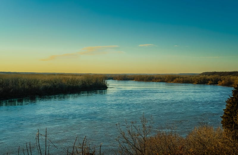 View of sunset on Missouri River in winter