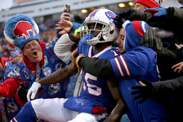 John Brown celebrates a TD with Bills fans.
