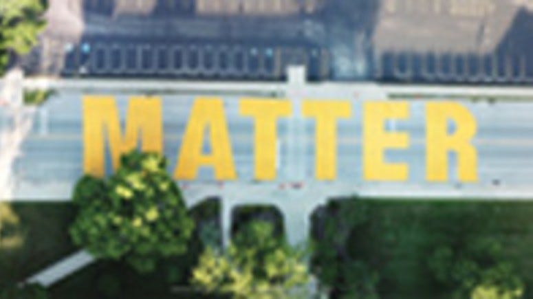 “Black Lives Matter” complete on Dodge Avenue between Church and Lake streets.