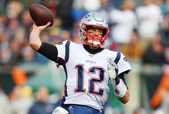 Tom Brady throws a pass against the Bengals.