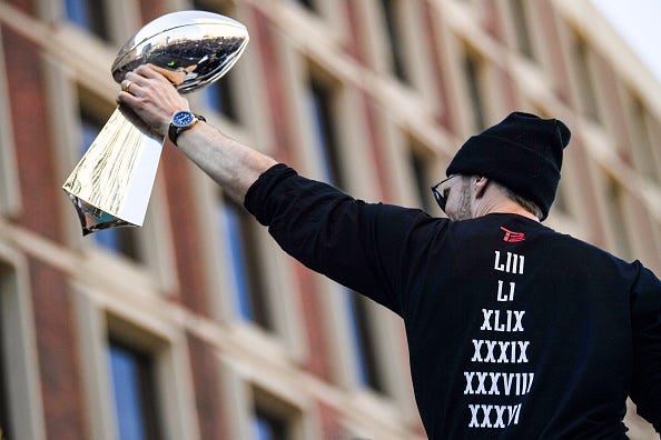 Tom Brady celebrates his sixth Lombardi Trophy.