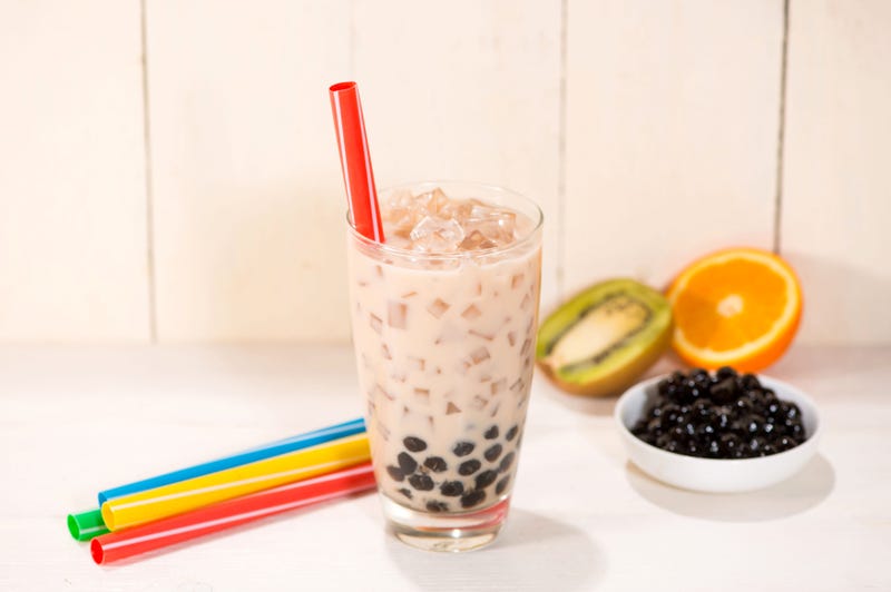 A glass of bubble tea with milk