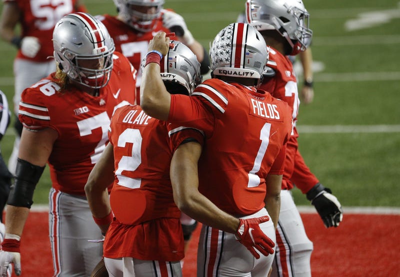 Ohio State Buckeyes wide receiver Chris Olave celebrates a 33-yard touchdown catch from quarterback Justin Fields during the fourth quarter of the NCAA football game against the Rutgers Scarlet Knights at Ohio Stadium.
