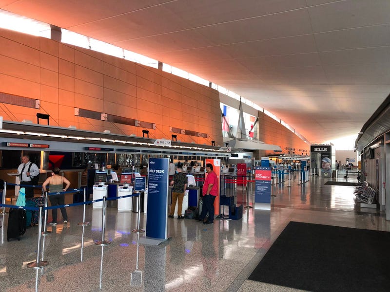 Travelers wear coronavirus masks at the Buffalo Niagara International Airport. July 1, 2020 (WBEN Photo/Mike Baggerman)