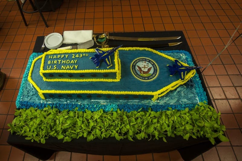 A birthday cake is displayed during the U.S. Navy’s 243rd birthday at Anderson Hall, Marine Corps Base Hawaii (MCBH), Oct. 12, 2018.