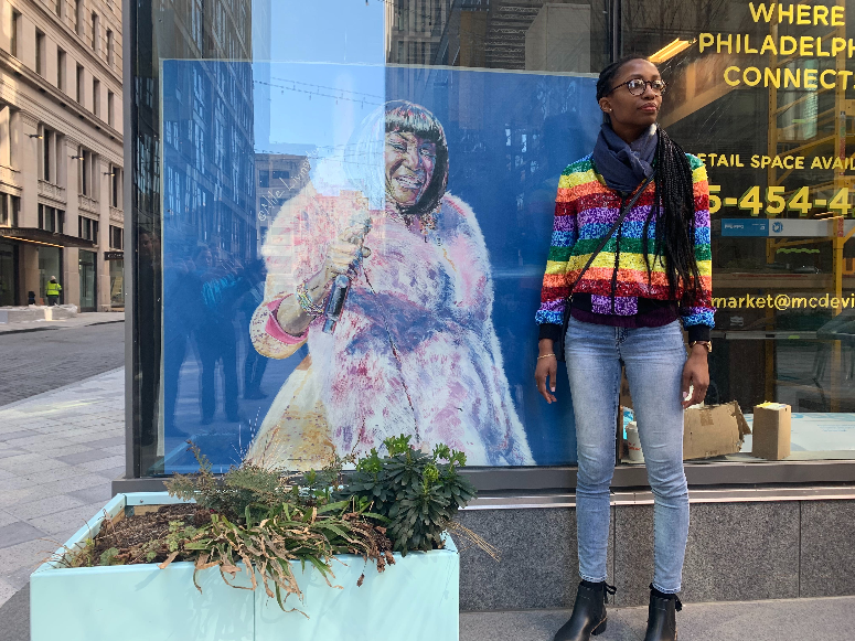 Visual artist Nile Livingston with her art.