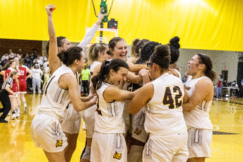 The Rowan University women's basketball team celebrates it's New Jersey Athletic Conference title.