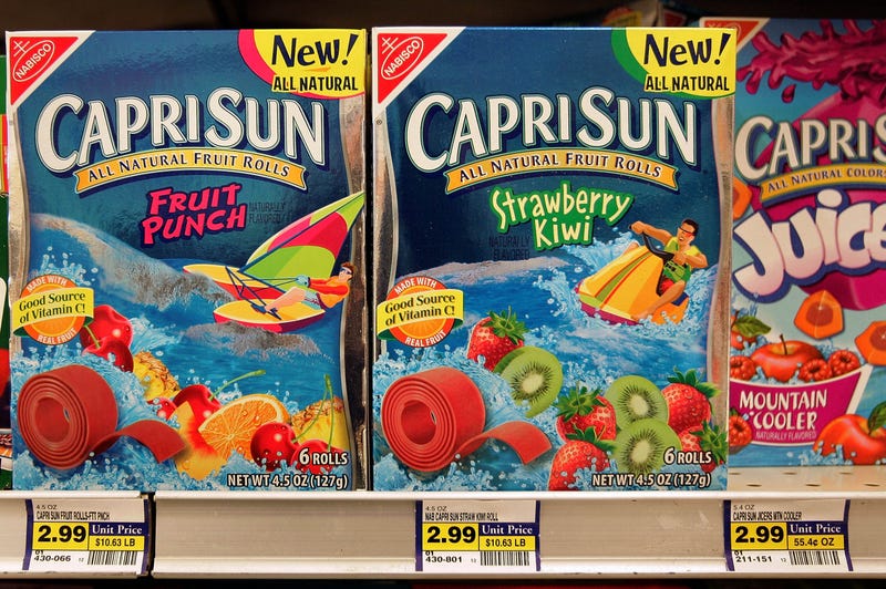 boxes of capri sun at a grocery story
