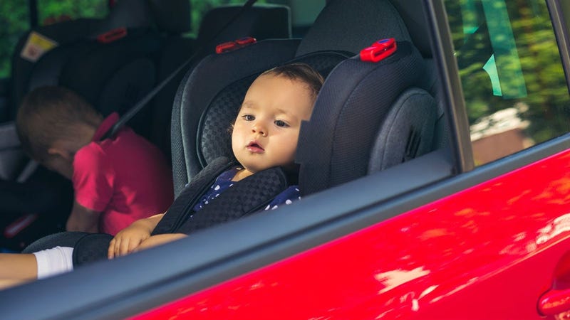 child in a car seat