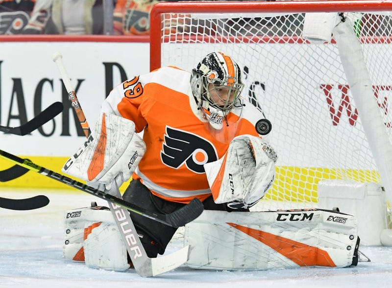Philadelphia Flyers goaltender Carter Hart (79) makes a save against the Vancouver Canucks during the first period at Wells Fargo Center.
