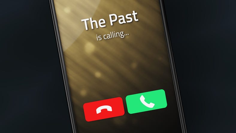 cell phone with message "The Past Is Calling"