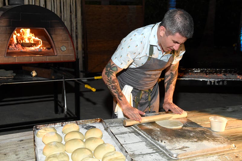 Chef Michael Solomonov rolling dough