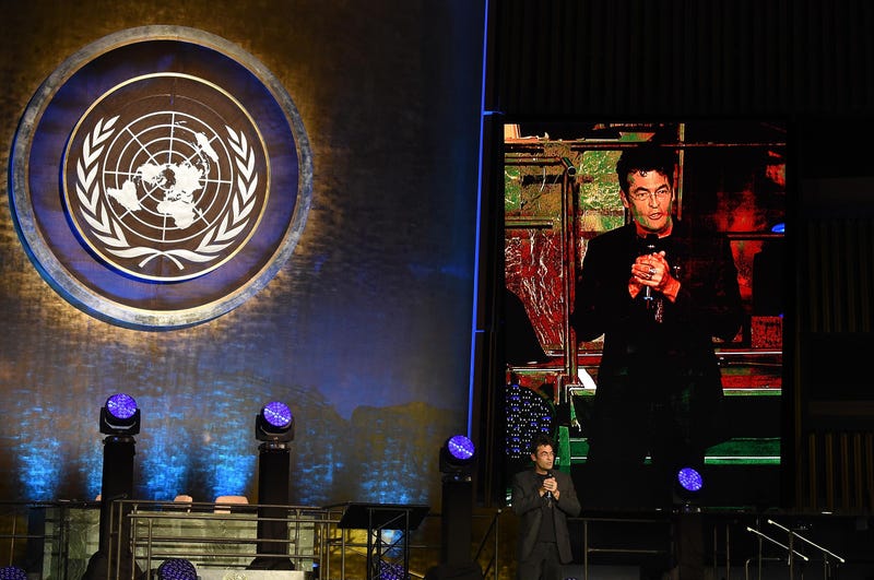Artist Chris Jordan giving a speech at the UN