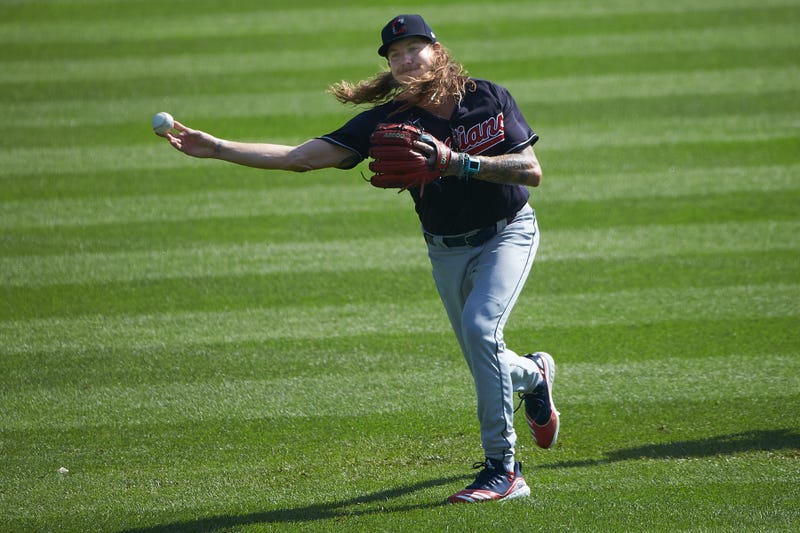 Mike Clevinger warms up in the outfield at Progressive Field on July 4, 2020
