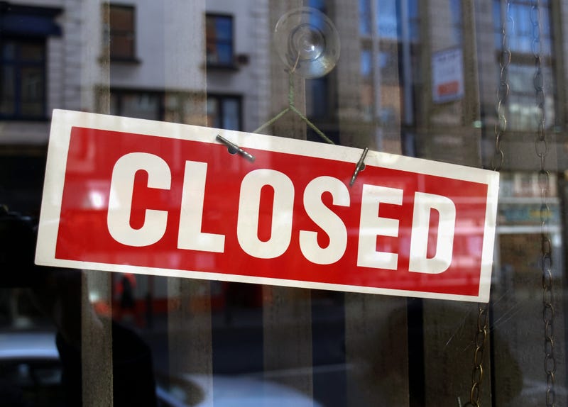 Closed sign a in shop window
