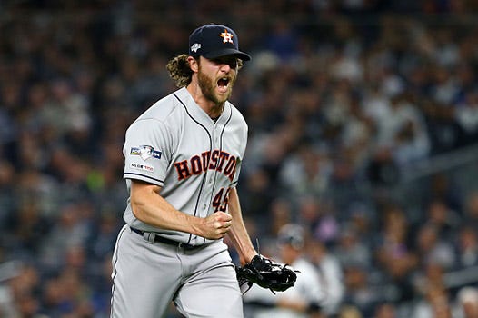 Gerrit Cole celebrates getting out of a jam in the ALCS.