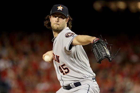 Gerrit Cole pitches for the Astros in the World Series.