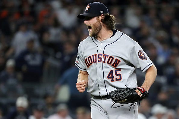 Gerrit Cole celebrates getting a big out against the Yankees.