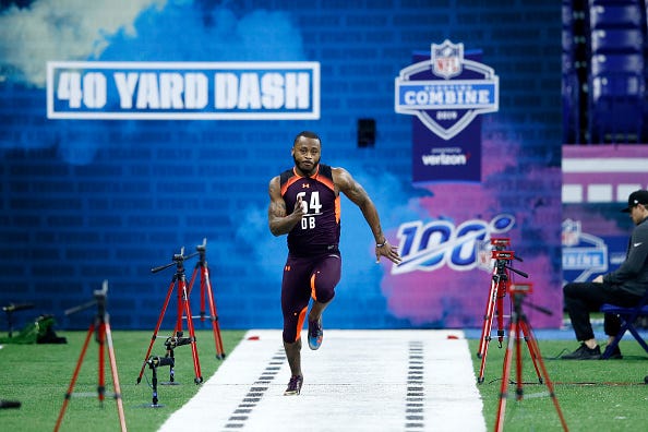 Defensive back Zedrick Woods runs the 40 at the 2019 NFL Combine.
