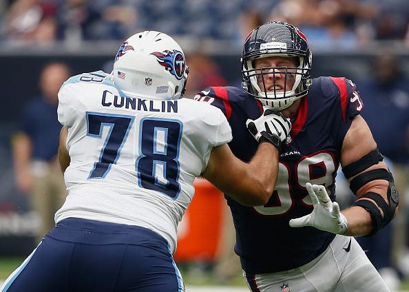 Jack Conklin blocks Texans' J.J. Watt.