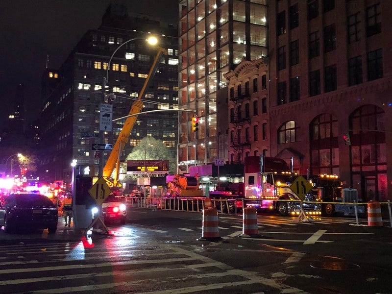 NYPD and EMS on the scene in response to a construction accident.