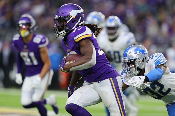 Dalvin Cooks evades a tackle against the Lions.