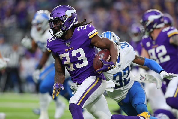 Dalvin Cooks zooms past the Lions defense.