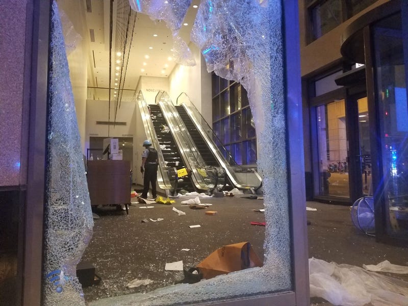 Cop In Store After Mag Mile Looting